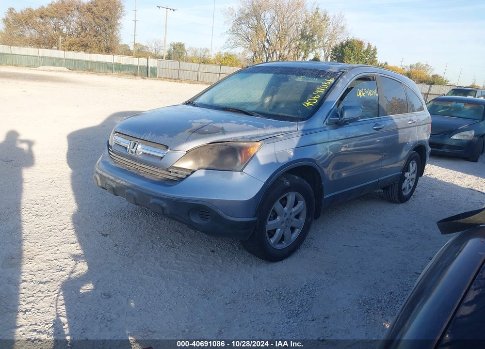 2007 HONDA CR-V EX-L VIN: JHLRE38727C011542