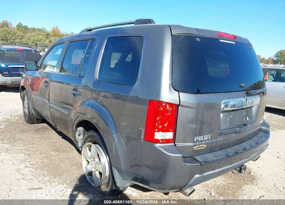 2011 HONDA PILOT EX-L VIN: 5FNYF4H77BB014685