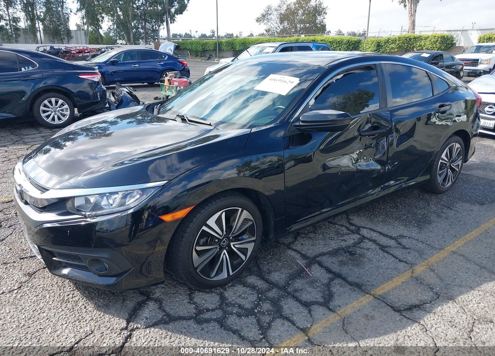 2016 HONDA CIVIC EX-L VIN: 2HGFC1F7XGH659450