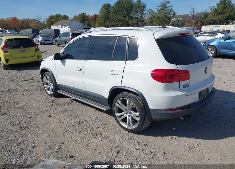2013 VOLKSWAGEN TIGUAN SEL VIN: WVGBV3AX7DW091497