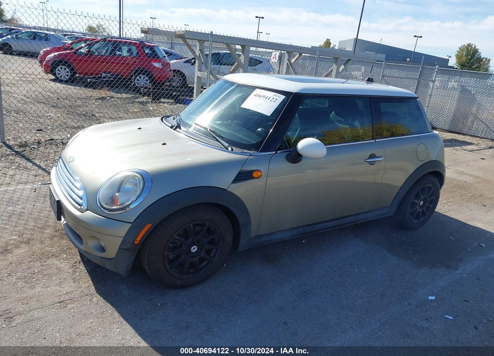 2008 MINI COOPER VIN: WMWMF335X8TT67939