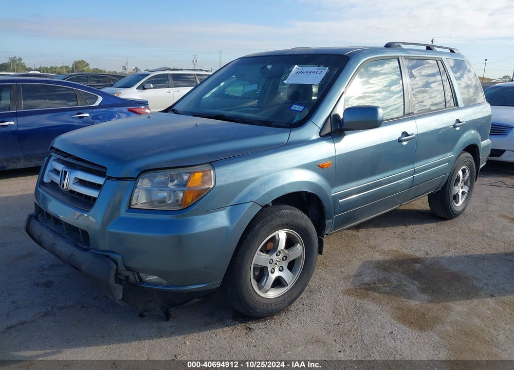 2006 HONDA PILOT EX-L VIN: 5FNYF28596B052394