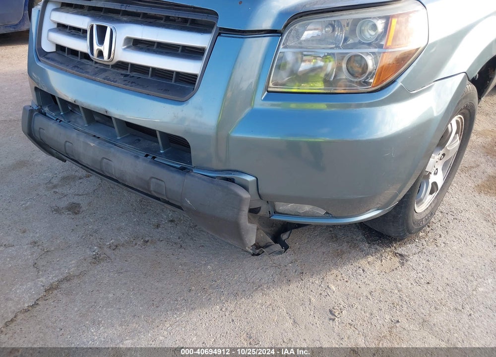 2006 HONDA PILOT EX-L VIN: 5FNYF28596B052394