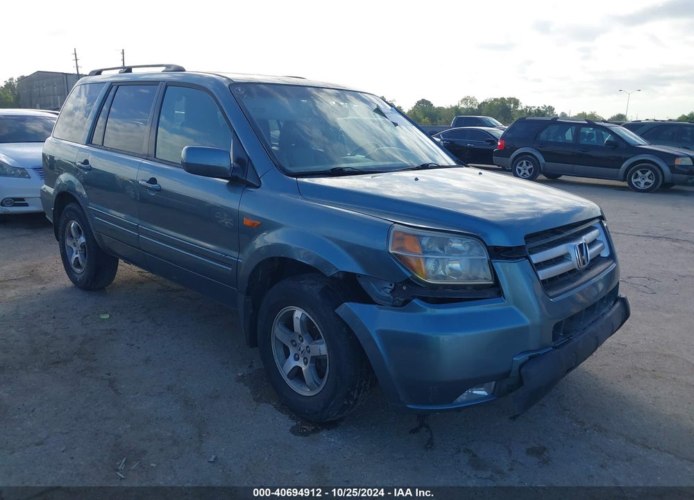 2006 HONDA PILOT EX-L VIN: 5FNYF28596B052394