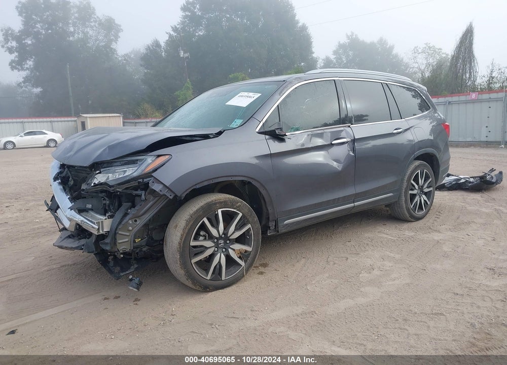 2022 HONDA PILOT 2WD TOURING 7 PASSENGER VIN: 5FNYF5H69NB000546