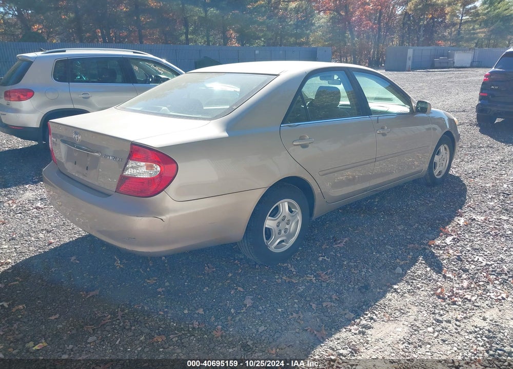 2003 TOYOTA CAMRY LE VIN: 4T1BE32KX3U749102