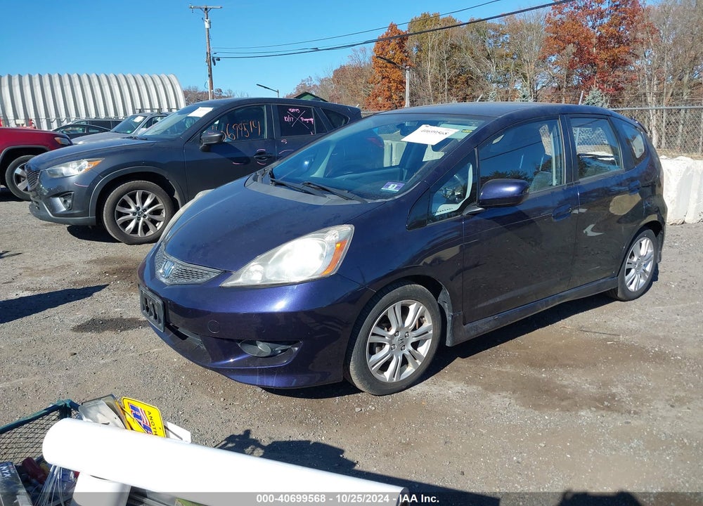 2009 HONDA FIT SPORT VIN: JHMGE88489S015853