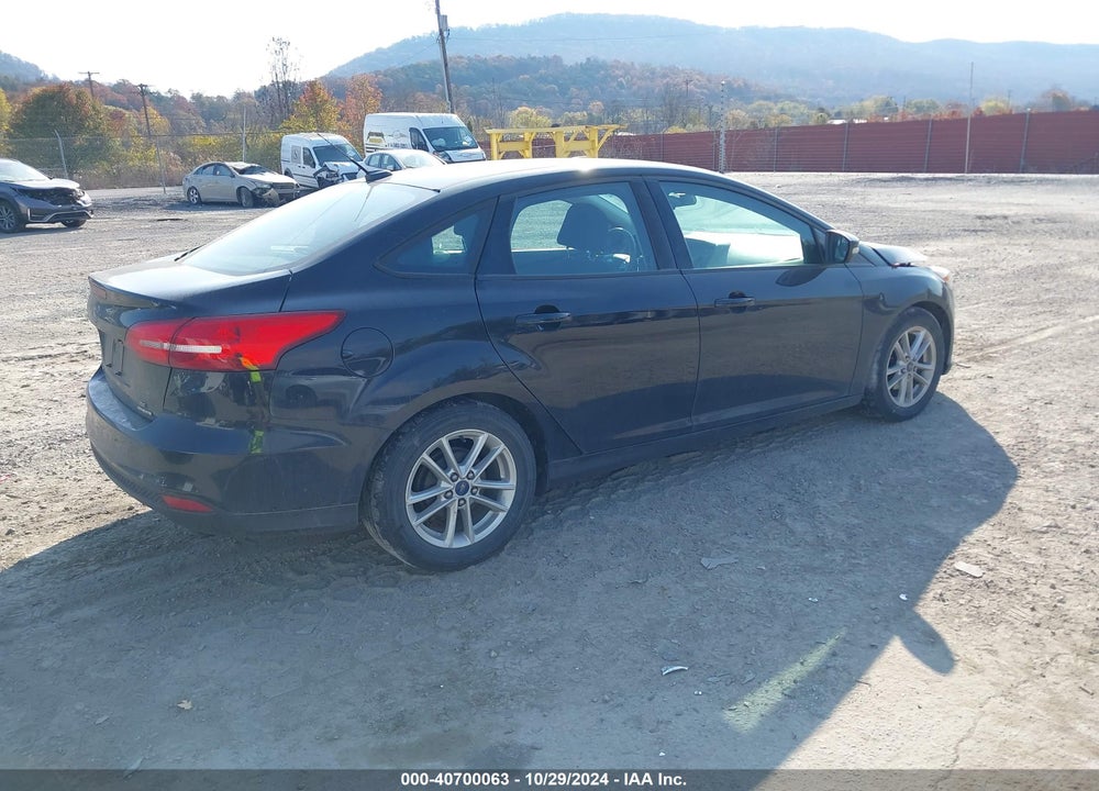 2016 FORD FOCUS SE VIN: 1FADP3F24GL237323