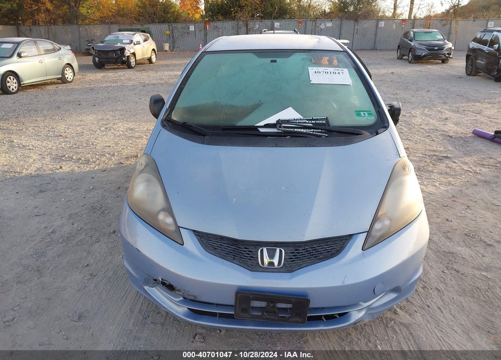 2009 HONDA FIT VIN: JHMGE88269S057145