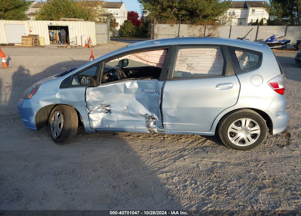 2009 HONDA FIT VIN: JHMGE88269S057145