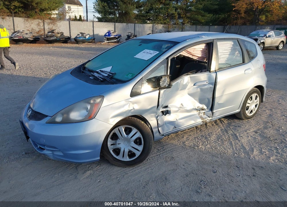 2009 HONDA FIT VIN: JHMGE88269S057145