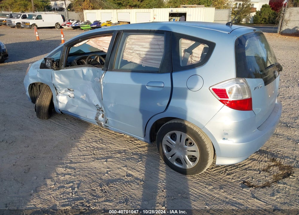 2009 HONDA FIT VIN: JHMGE88269S057145