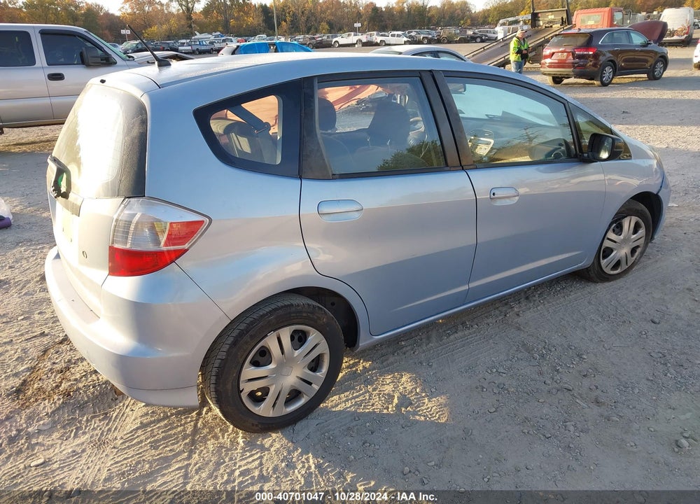 2009 HONDA FIT VIN: JHMGE88269S057145