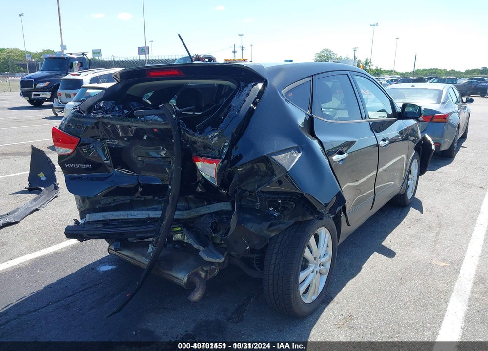 2013 HYUNDAI TUCSON LIMITED VIN: KM8JUCAC1DU622748