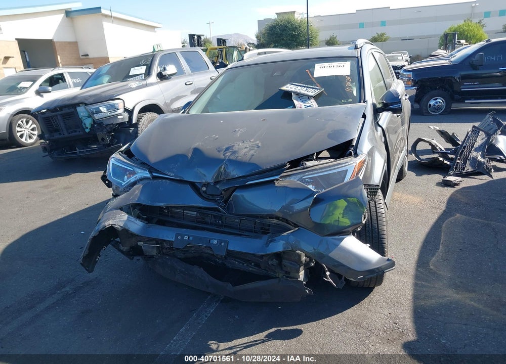 2018 TOYOTA RAV4 HYBRID XLE VIN: JTMRJREV5JD198257