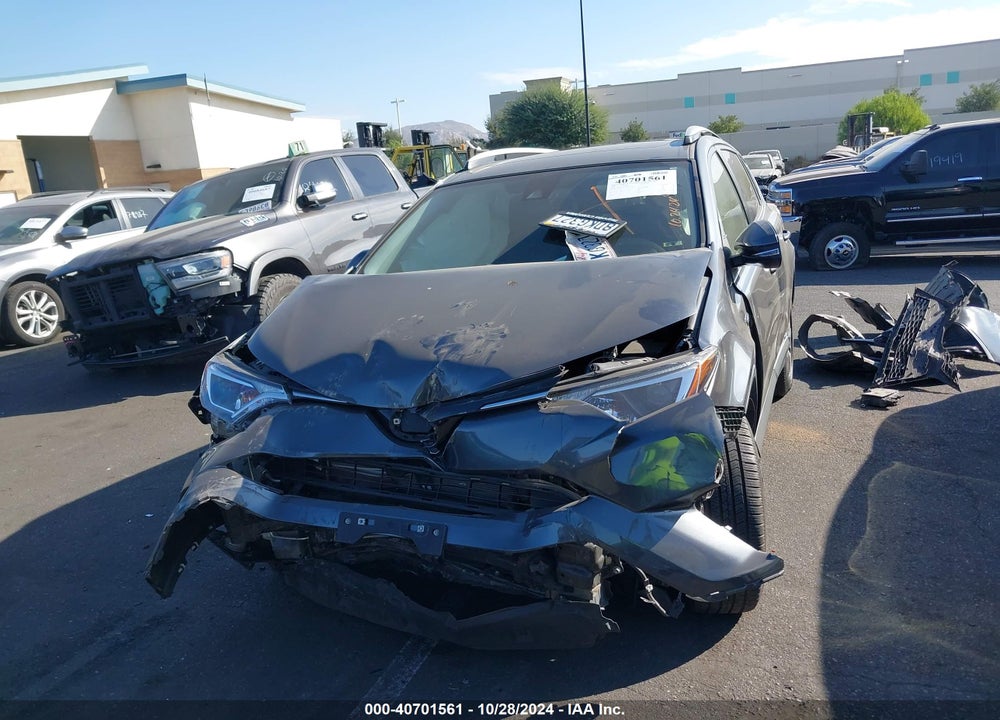 2018 TOYOTA RAV4 HYBRID XLE VIN: JTMRJREV5JD198257