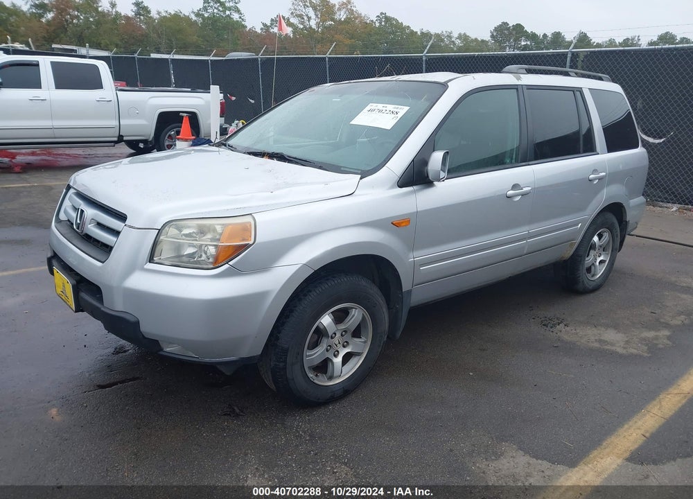 2007 HONDA PILOT EX-L VIN: 5FNYF28667B013157