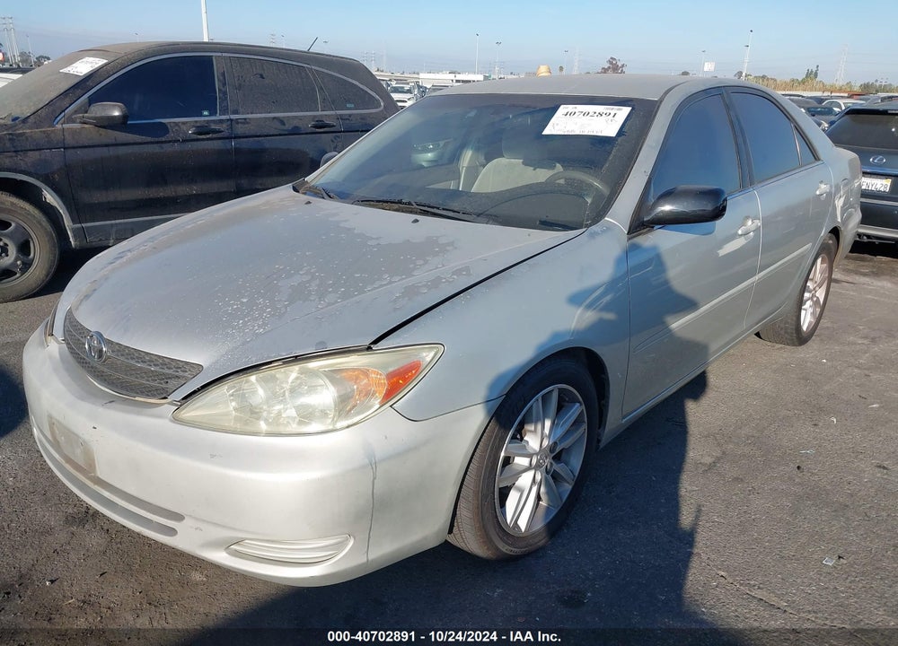 2003 TOYOTA CAMRY LE V6 VIN: 4T1BF32K93U563189
