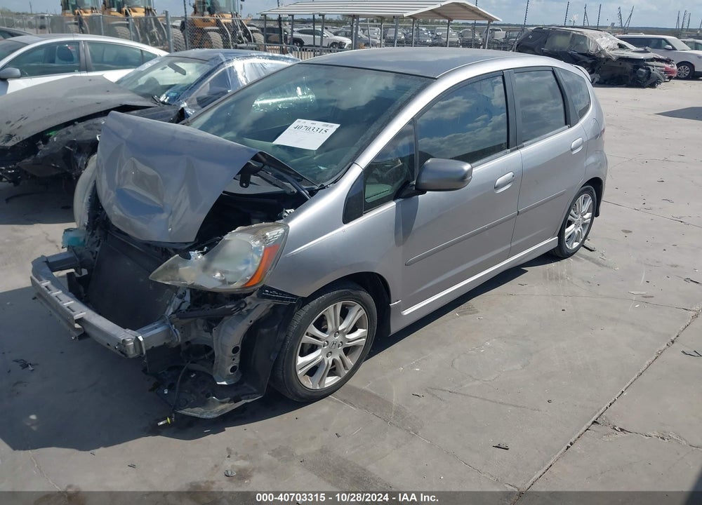 2010 HONDA FIT SPORT VIN: JHMGE8H44AS015806