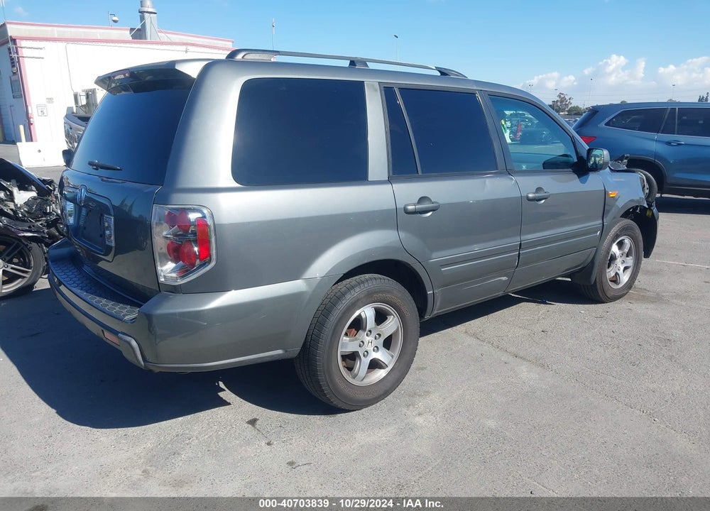 2007 HONDA PILOT EX-L VIN: 5FNYF28667B016883