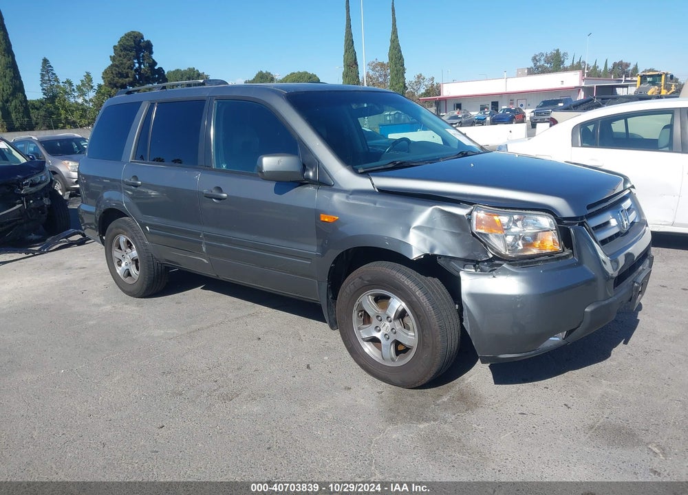 2007 HONDA PILOT EX-L VIN: 5FNYF28667B016883