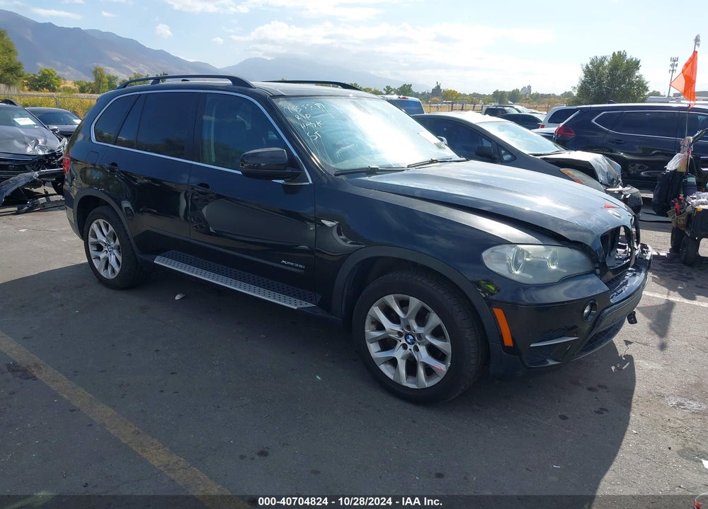 2013 BMW X5 XDRIVE35I/XDRIVE35I PREMIUM/XDRIVE35I SPORT ACTIVITY VIN: 5UXZV4C54DL993349