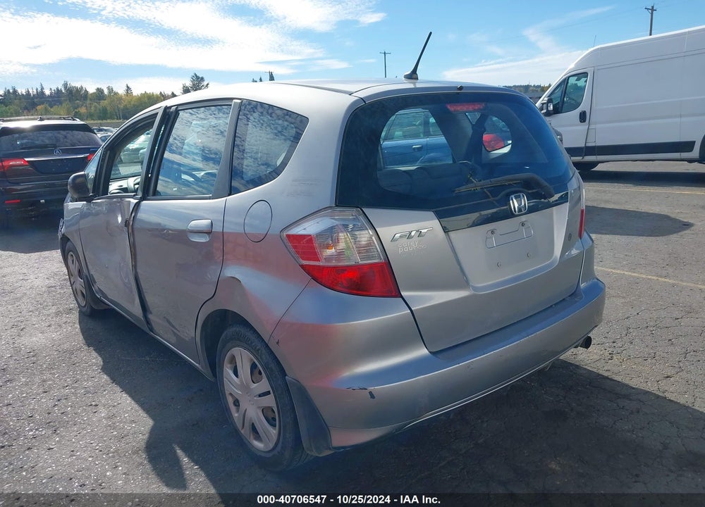 2009 HONDA FIT VIN: JHMGE87289S054037