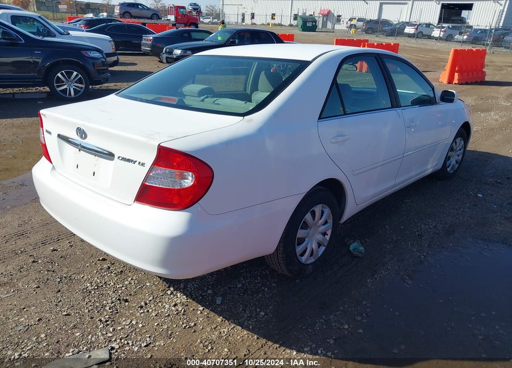 2003 TOYOTA CAMRY LE VIN: JTDBE32K830221523