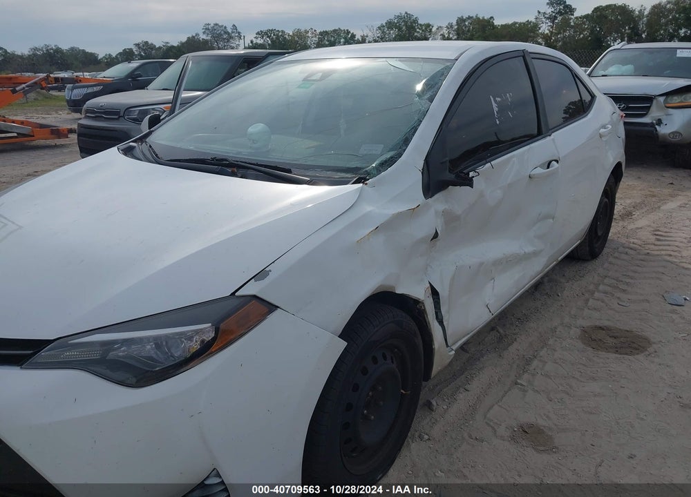 2017 TOYOTA COROLLA LE VIN: 5YFBURHE9HP597300