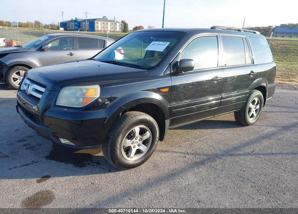2006 HONDA PILOT EX-L VIN: 5FNYF18506B013297