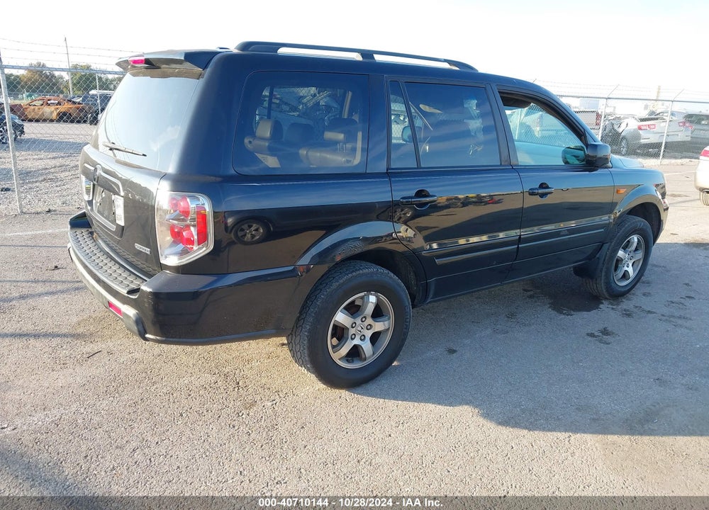 2006 HONDA PILOT EX-L VIN: 5FNYF18506B013297