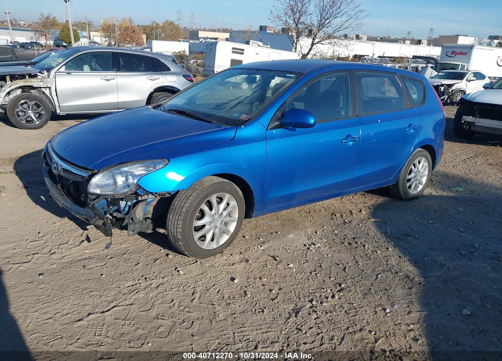 2009 HYUNDAI ELANTRA TOURING VIN: KMHDC86E79U031743