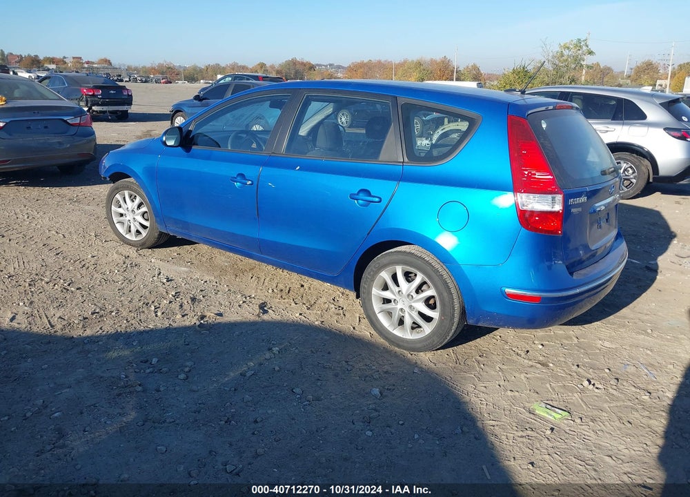 2009 HYUNDAI ELANTRA TOURING VIN: KMHDC86E79U031743
