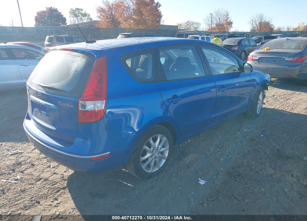 2009 HYUNDAI ELANTRA TOURING VIN: KMHDC86E79U031743