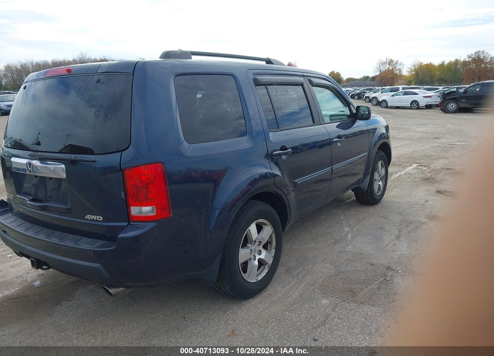 2011 HONDA PILOT EX-L VIN: 5FNYF4H56BB010576