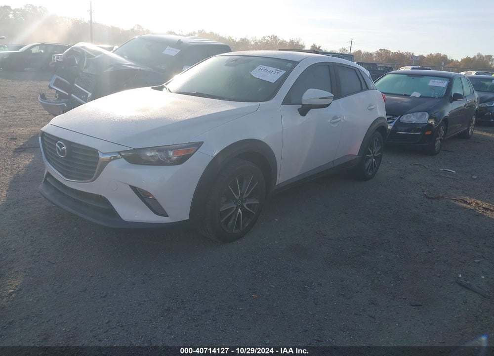 2018 MAZDA CX-3 TOURING VIN: JM1DKFC72J1306202
