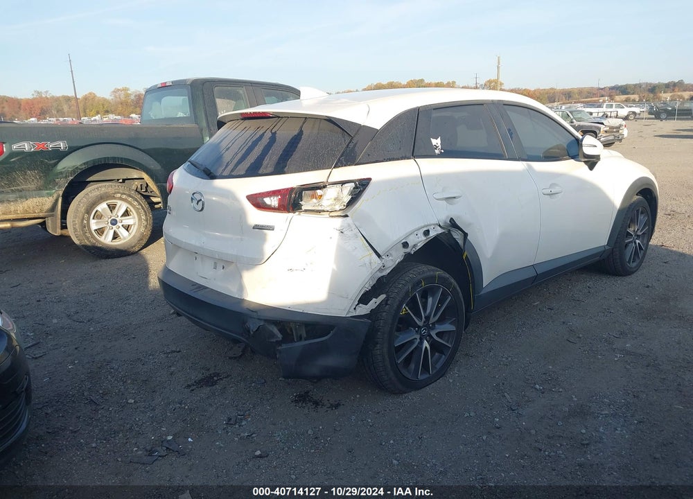 2018 MAZDA CX-3 TOURING VIN: JM1DKFC72J1306202