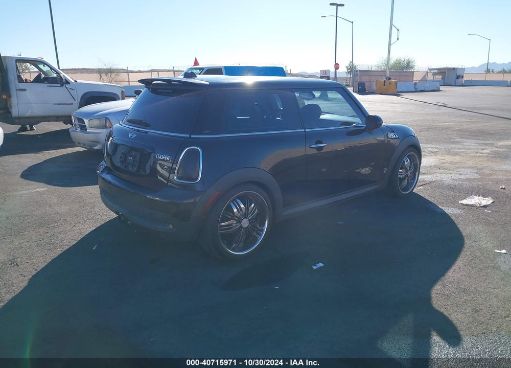 2010 MINI COOPER S VIN: WMWMF7C54ATW88887