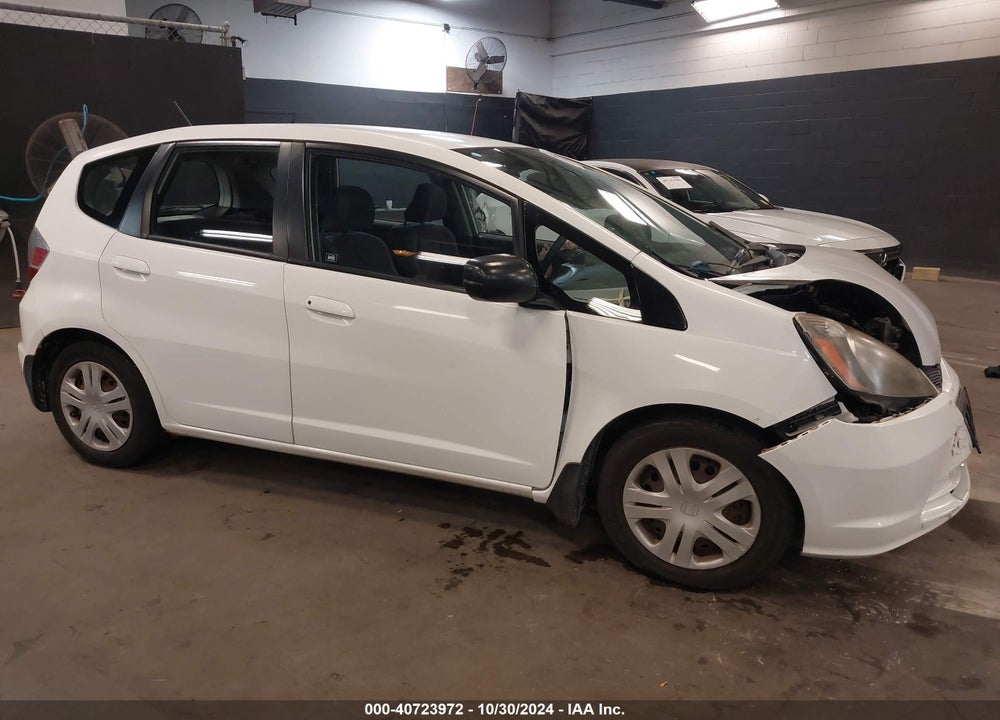 2009 HONDA FIT VIN: JHMGE882X9S069864