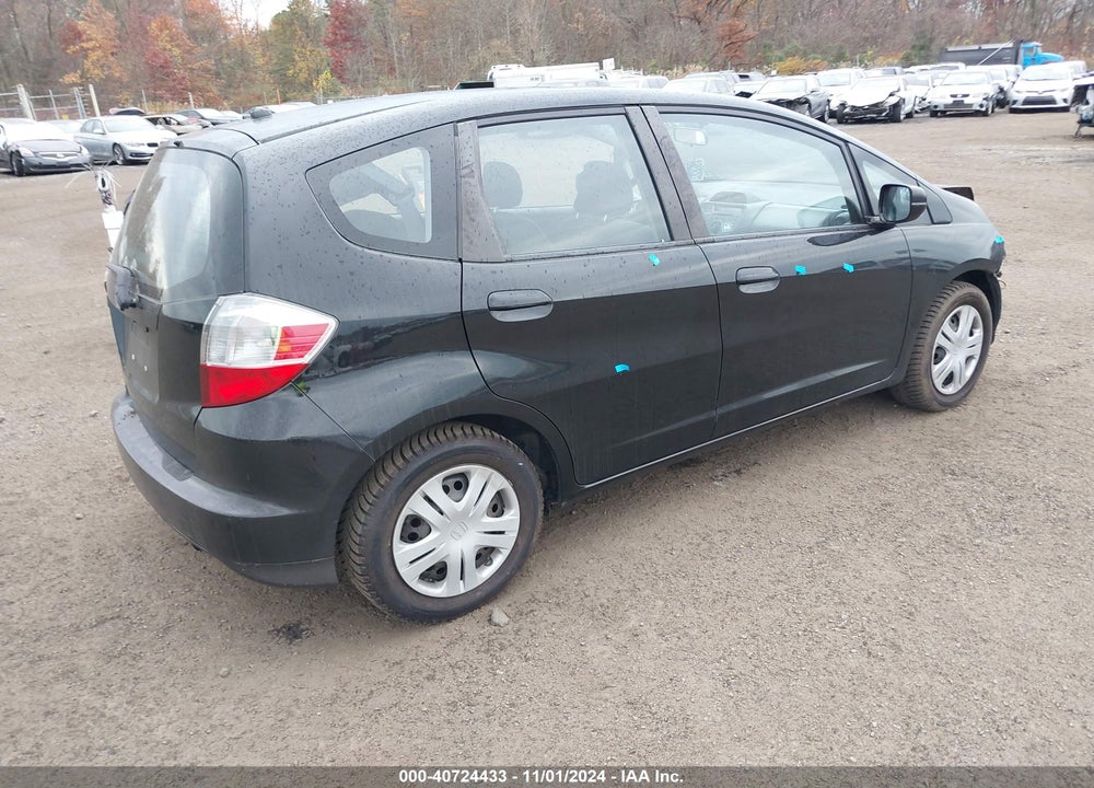 2011 HONDA FIT VIN: JHMGE8H37BS007272