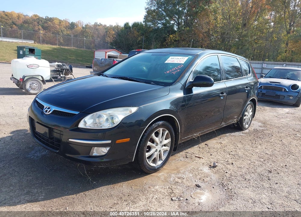 2009 HYUNDAI ELANTRA TOURING VIN: KMHDC86E79U049157