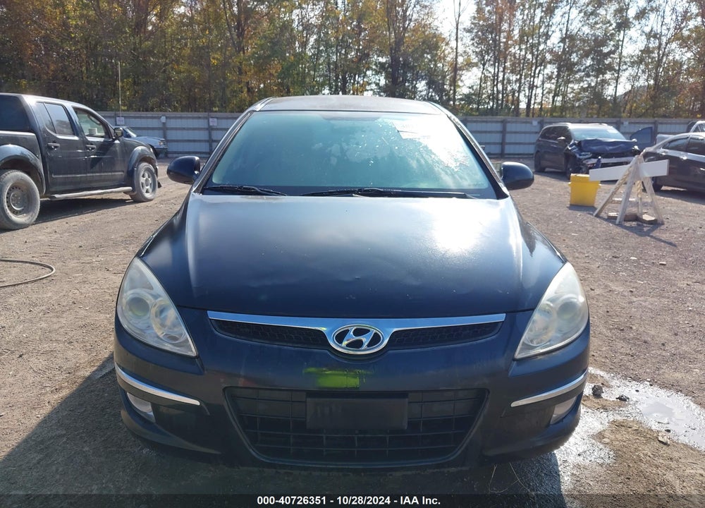 2009 HYUNDAI ELANTRA TOURING VIN: KMHDC86E79U049157