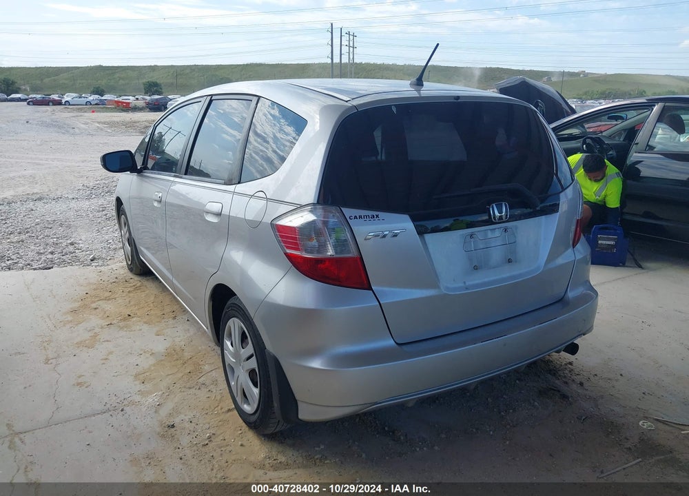 2011 HONDA FIT VIN: JHMGE8H38BS008804