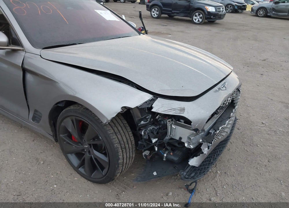 2022 GENESIS G70 3.3T AWD VIN: KMTG54TE6NU104119