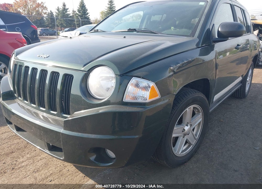 2010 JEEP COMPASS SPORT VIN: 1J4NF1FB0AD623657