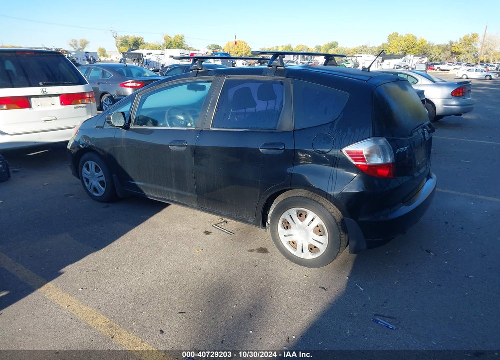 2009 HONDA FIT VIN: JHMGE88299S058032
