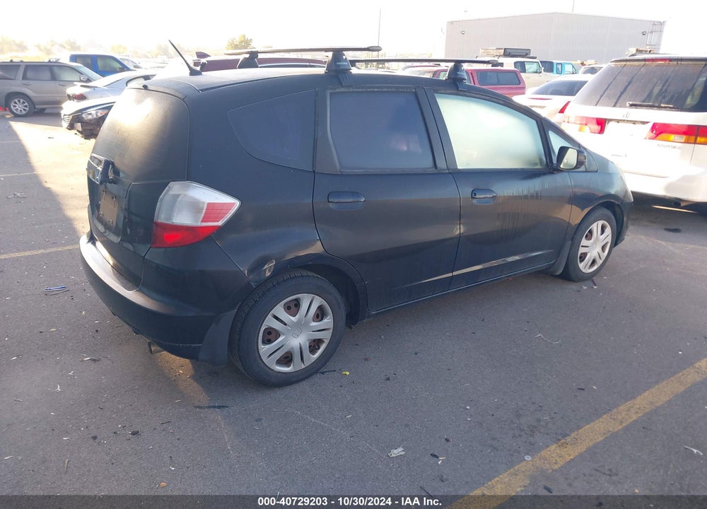 2009 HONDA FIT VIN: JHMGE88299S058032