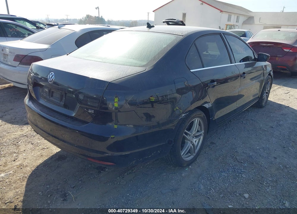 2014 VOLKSWAGEN JETTA 1.8T SE VIN: 3VWD17AJ2EM309890