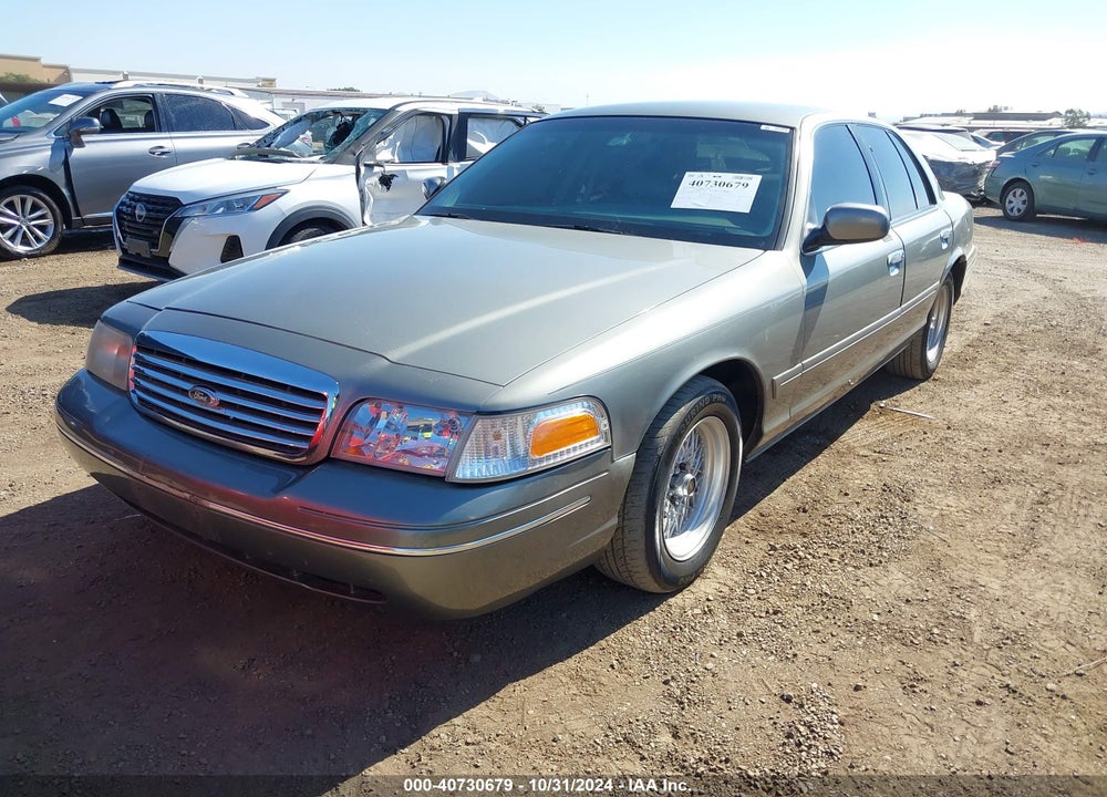 1999 FORD CROWN VICTORIA LX VIN: 2FAFP74W0XX166582