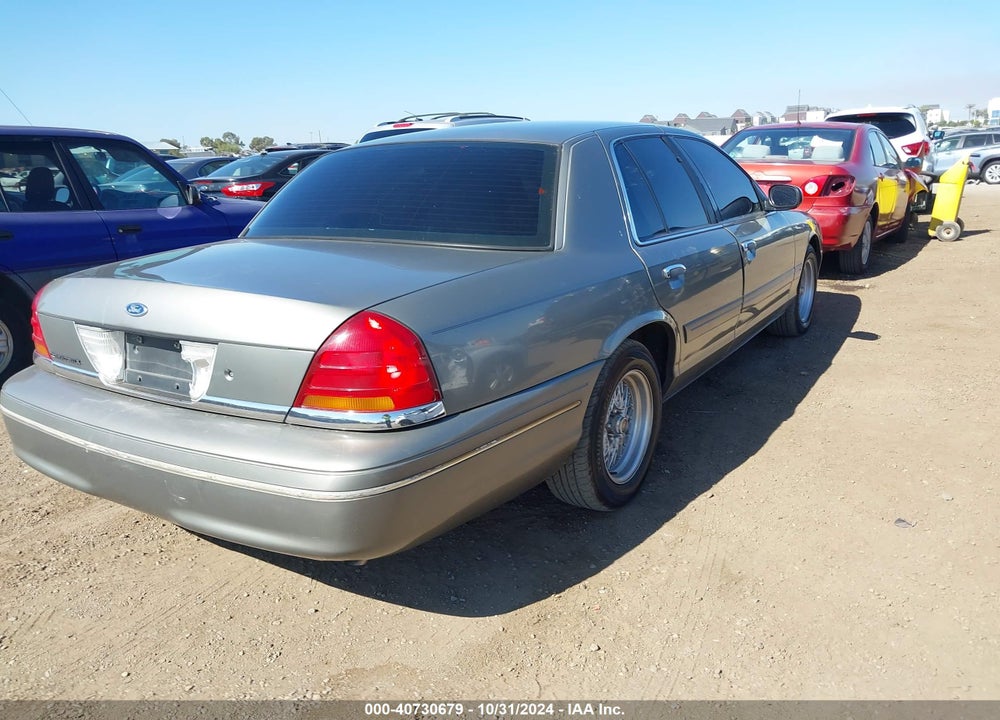 1999 FORD CROWN VICTORIA LX VIN: 2FAFP74W0XX166582